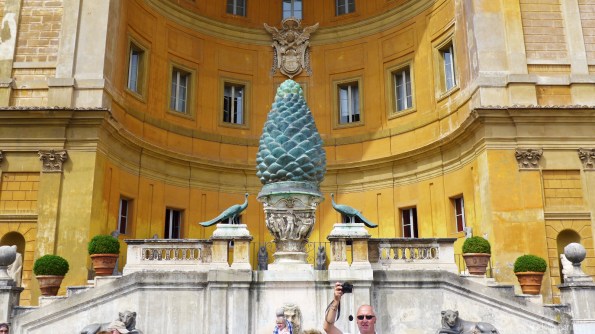 The Rion (or pinecone) represents the Vatican region of Rome