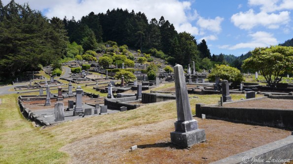The cemetery is odd, placed on a hillside with many crypts that are now sealed in concrete.