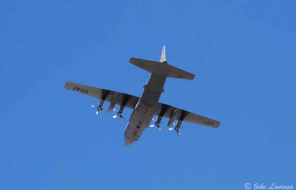 A C130 doing touch and goes at F E Warren AFB
