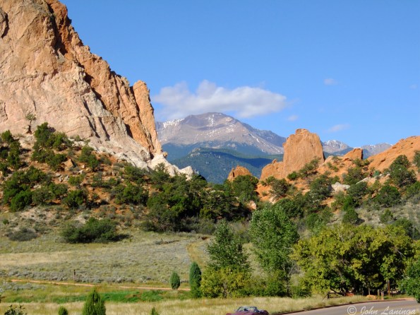 Pikes Peak looms between some of the Garden's rocks