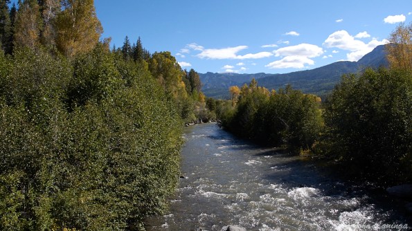 Nice view up the river, mountains behind