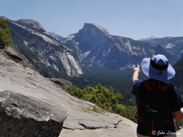 Romola pointing toward Half Dome