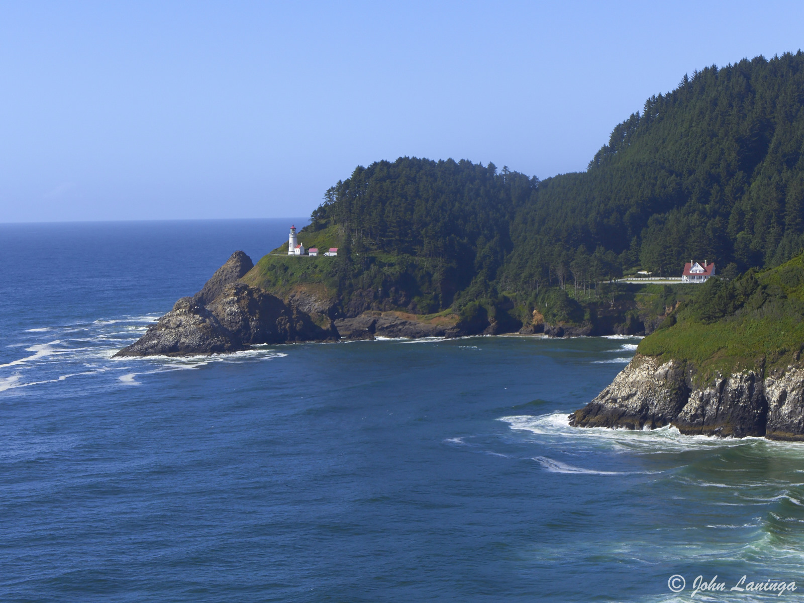 Distan view of Heceta Head lighthouse