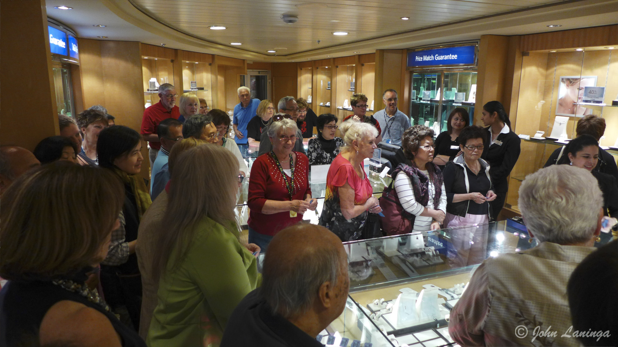 Romola getting caught up in the shopping frenzy.  She doesn't spend much, though.