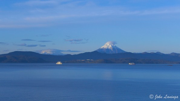 One of the volcanos.  Look in the water, far right...
