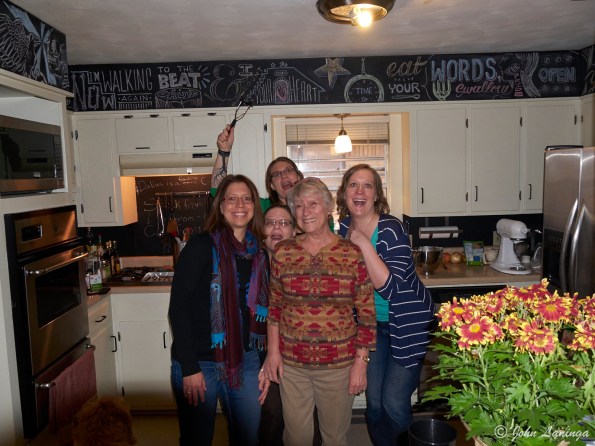 The women hamming it up in the kitchen