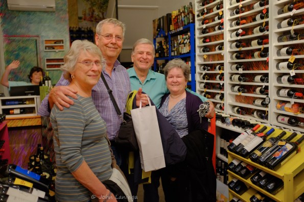 Happy with our wine purchases in the wine store.