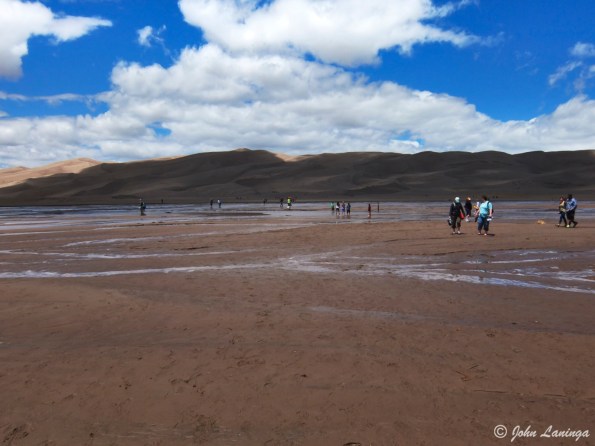 Many people cross the rive to hike in the dunes