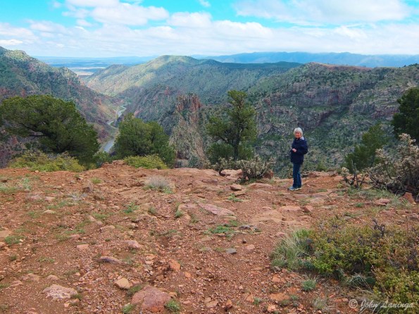 Romola standing at the rim of the Canyon
