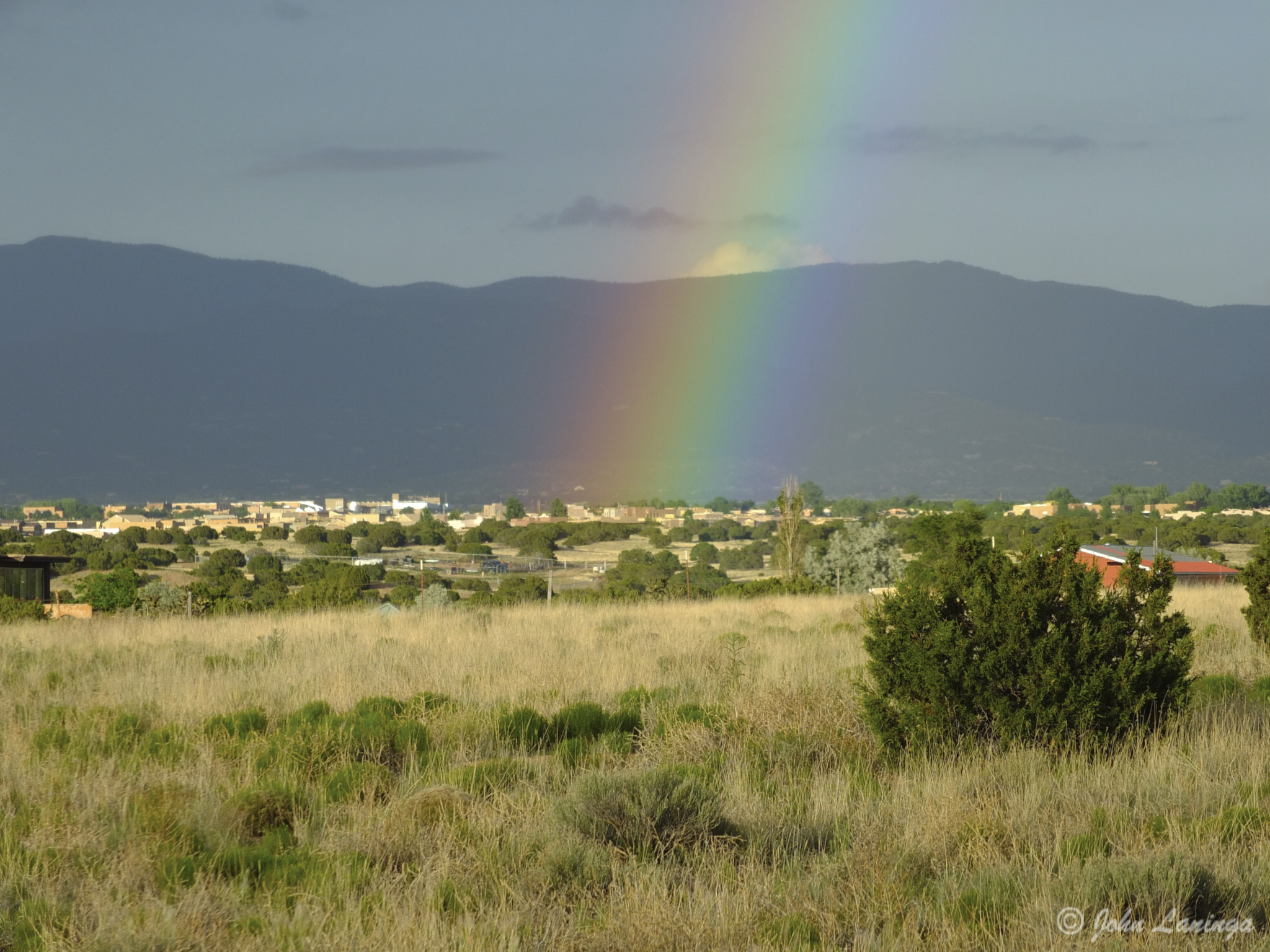 A rainbow over the foothills