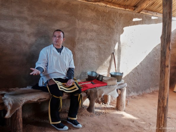 Our  guide, explaining life in an Cherokee house